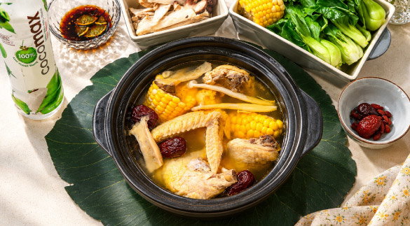 coconut chicken hot pot with veggies and corn